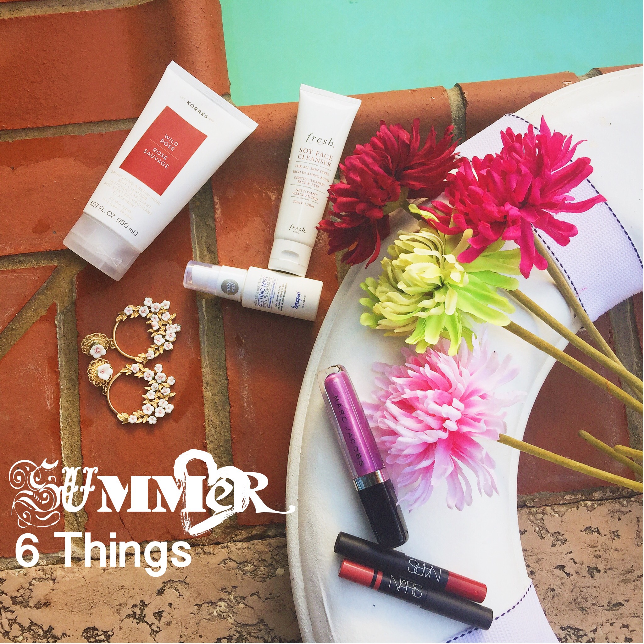 Beauty products and tips for spring and summer featuring korres rose cleanser, fresh soy cleanser, aldo flower earrings, supergoop spf setting mist, nars red lipstick cruella, marc jacobs beauty lip gloss