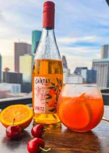 mocktail, non-alcoholic drink, summer mocktail, aperol spritz alternative, Santat Spritz, European summer drink, cherry mocktail, alcohol-free aperitif, Italian soda mocktail, Portofino-inspired drink, bitter orange mocktail, alcohol-free cocktail, Mediterranean mocktail, sober summer drink, elegant mocktail