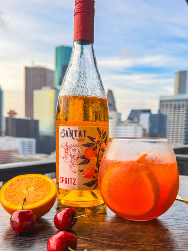 mocktail, non-alcoholic drink, summer mocktail, aperol spritz alternative, Santat Spritz, European summer drink, cherry mocktail, alcohol-free aperitif, Italian soda mocktail, Portofino-inspired drink, bitter orange mocktail, alcohol-free cocktail, Mediterranean mocktail, sober summer drink, elegant mocktail