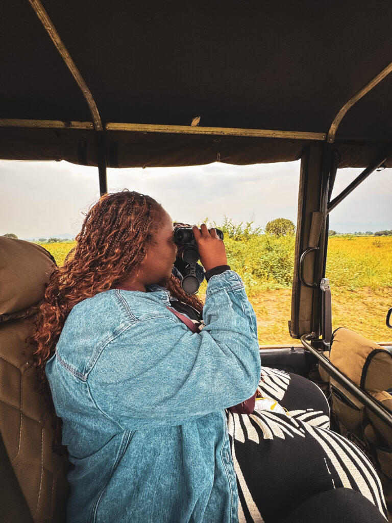 Queen Elizabeth National Park safari, Uganda safari travel, Kazinga Channel boat cruise, wildlife in Queen Elizabeth National Park, lions in Uganda safari, Uganda safari vlog, western Uganda travel guide, Kazinga Channel wildlife, Uganda safari animals, Queen Elizabeth Bush Lodge Uganda, Uganda travel blog safari, African safari Uganda